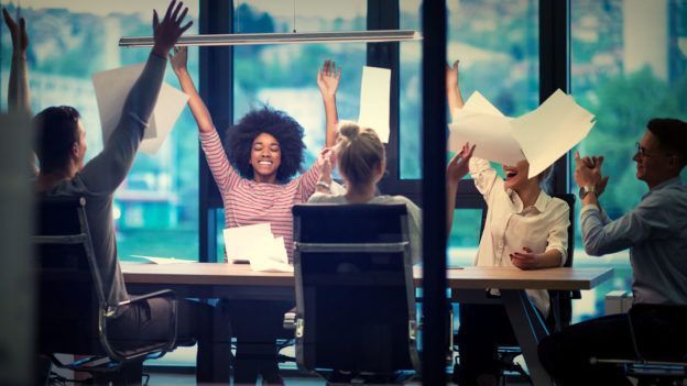 photo of students celebrating success in implementing innovative enterprise blockchain technology strategy certification program from the blockchain academy